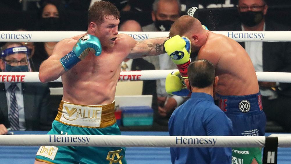 Canelo unifies titles after Saunders' corner waves off ...