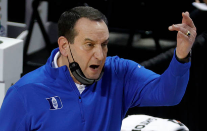 Head coach Mike Krzyzewski of the Duke Blue Devils reacts following a play during the first half of their second round game against the Louisville Cardinals