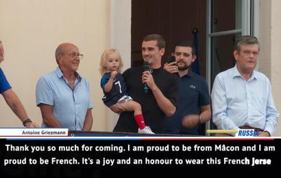Thousands welcome home hero Griezmann