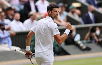 Novak Djokovic celebrates on Centre Court