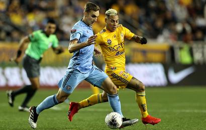 New York City FC's James Sands and Tigres' Eduardo Vargas chase the ball