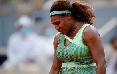 Serena Williams of the U.S. looks dejected after losing her fourth round match against Kazakhstan's Elena Rybakina