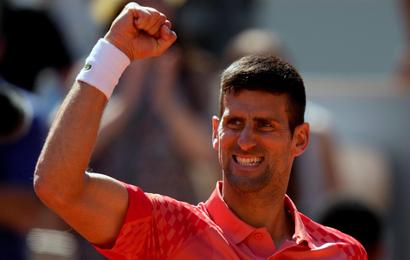 Novak Djokovic celebrates beating Juan Pablo Varillas