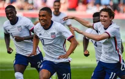 Reggie Cannon #20 of the United States celebrates a goal during a game against Costa Rica at Rio Tinto Stadium