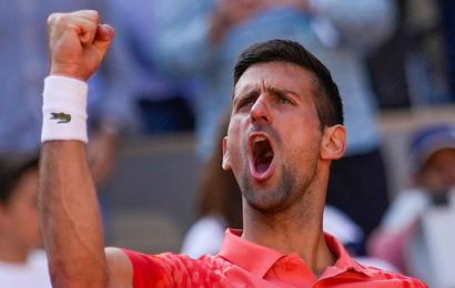 Novak Djokovic celebrates winning his quarter-final match
