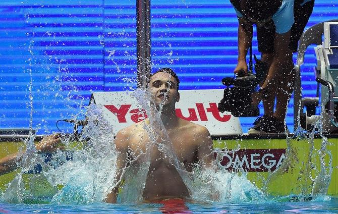 Milak crushes Phelps record to win world 200m butterfly gold - 670 x 424 jpeg 83kB