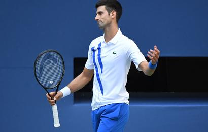 Novak Djokovic reacts after losing a point to Pablo Carreno Busta in the US Open