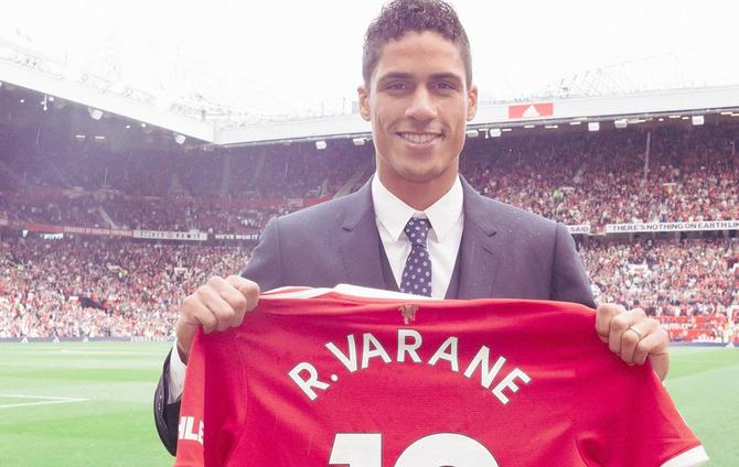 Varane completes move to United