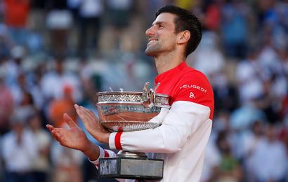 Serbia's Novak Djokovic celebrates with the trophy after winning the French Open against Greece's Stefanos Tsitsipas