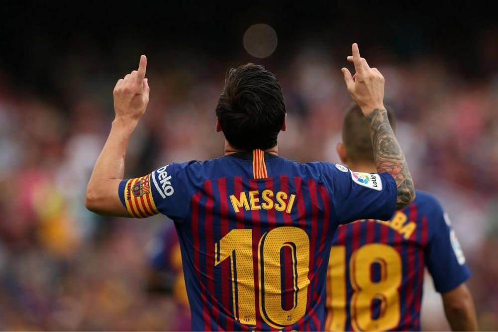FC Barcelone: Ronaldinho veut retirer le N° 10 de Lionel Messi