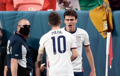 United States forward Gio Reyna (7) celebrates his goal with forward Christian Pulisic (10) in the first half Mexico against Mexico during the 2021 CONCACAF Nations League Finals soccer series final