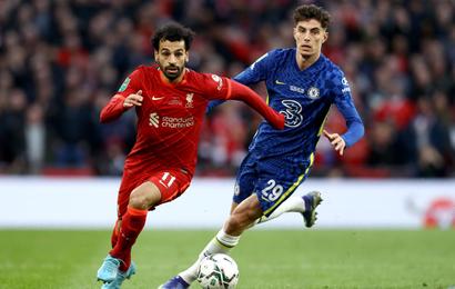 Mohamed Salah of Liverpool L is challenged by Kai Havertz of Chelsea during the Carabao Cup match at Wembley Stadium, London.