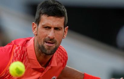 Novak Djokovic watches the ball in his win over Marton Fucsovics